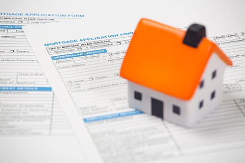 Foam house on top of mortgage application form